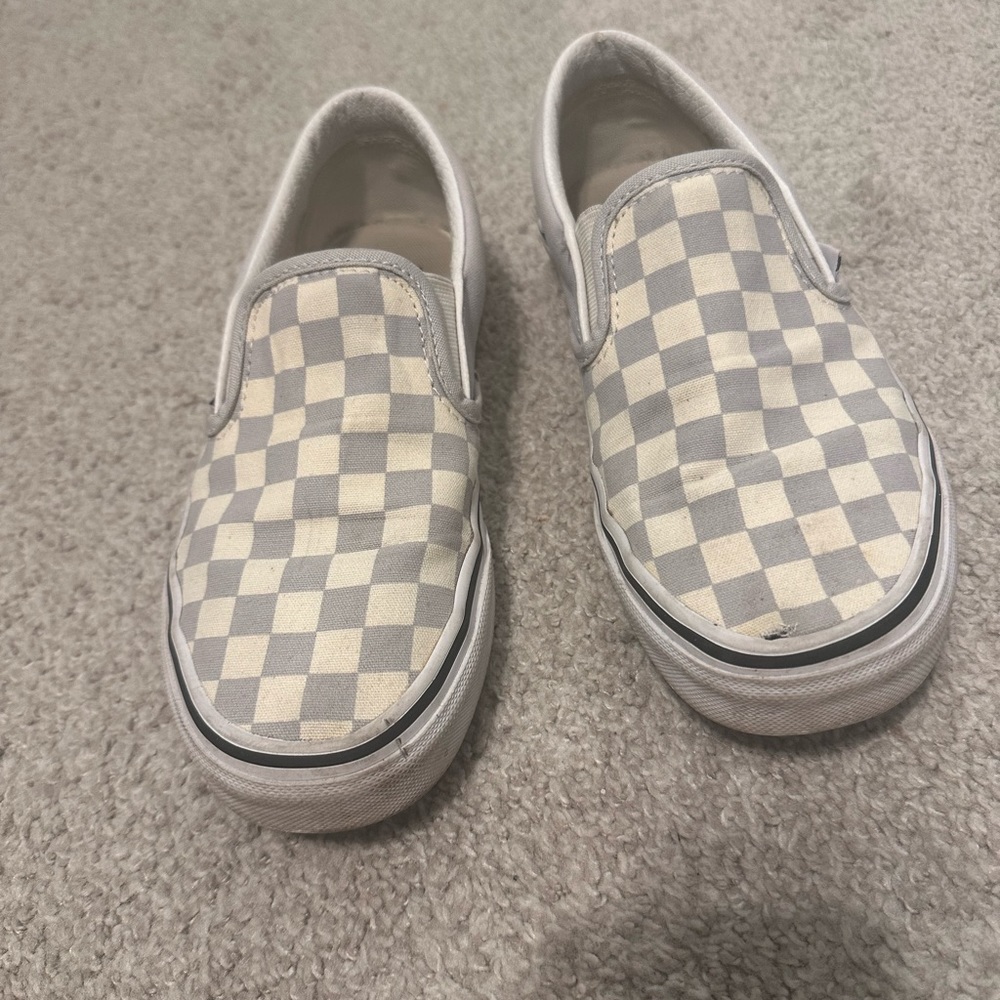 Vans slip-on checkerboard shoe. Woman’s 7.5. Men’s 6.